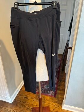 2 pairs of Hoka One One Women’s Leggings - one large and one x-large
